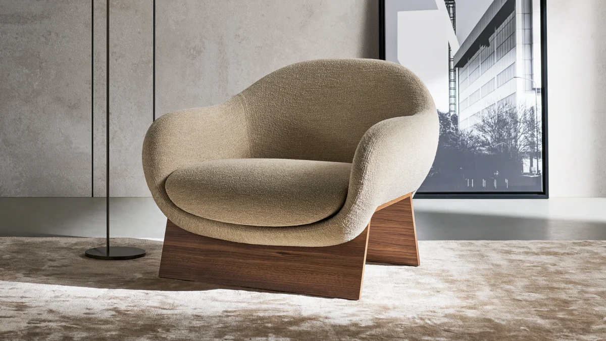 Bonaldo Boolean fixed‑base armchair upholstered in luxurious eco‑leather with sleek coal oak support structure