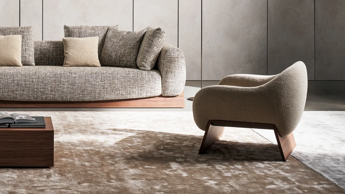 Modern Boolean lounge chair by Bonaldo featuring coal oak linear base contrasting plush rounded upholstery