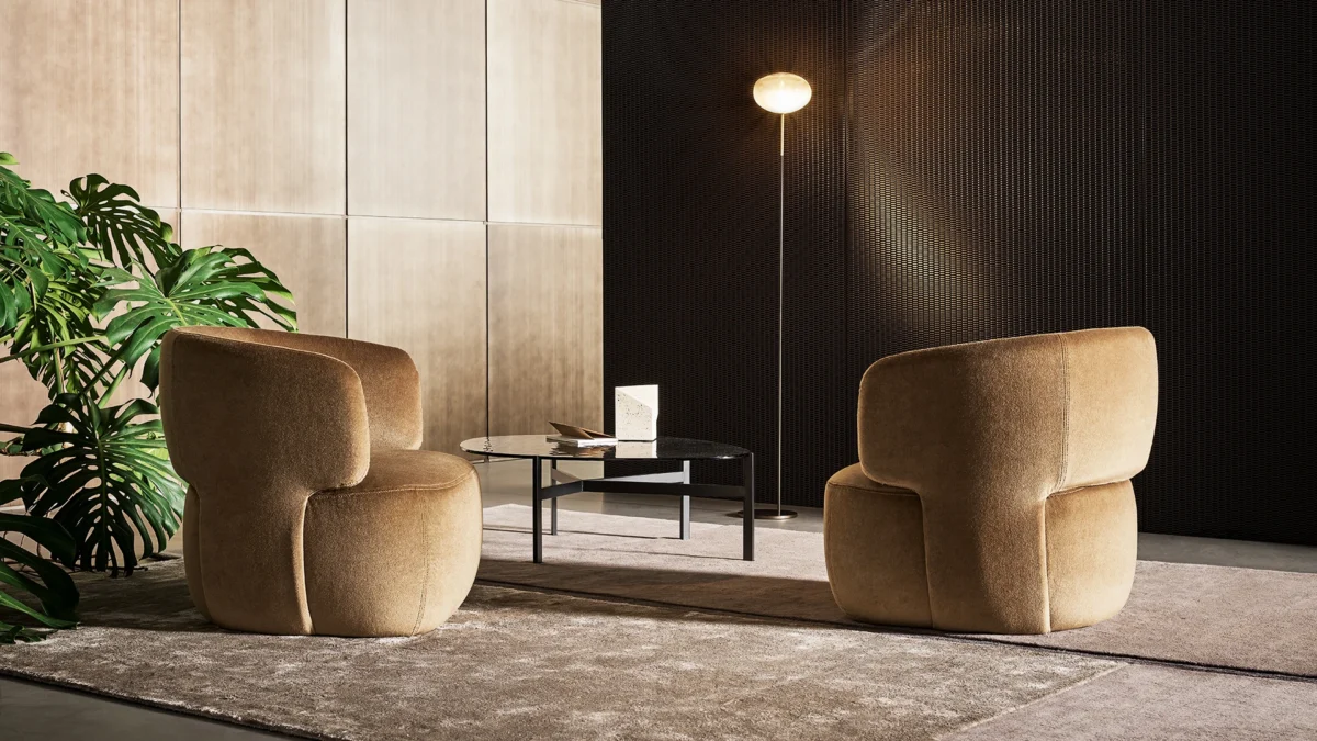 Italian-designed Doge armchair by Mauro Lipparini with swivel metal base and compact upholstered shell