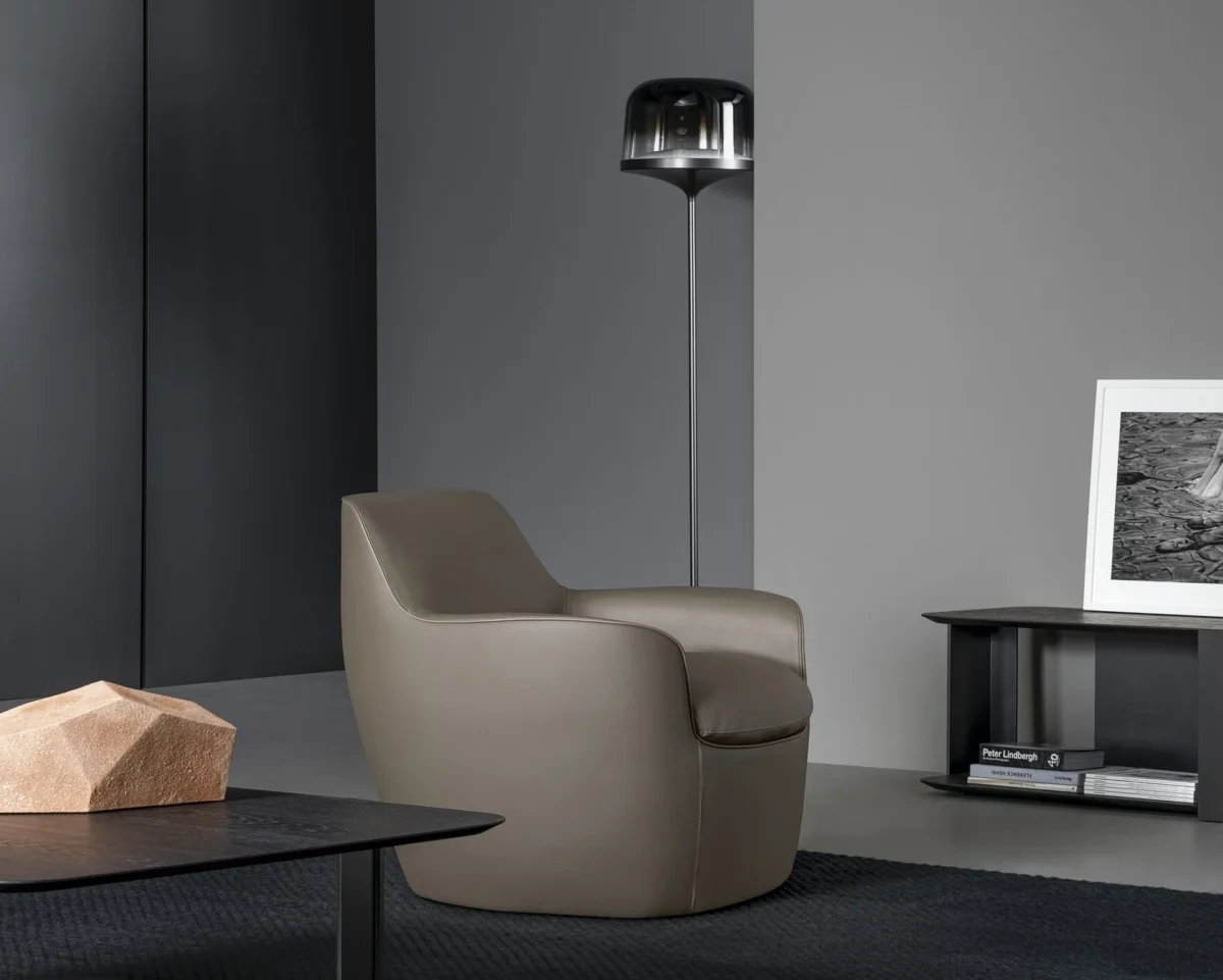 Elegant Next seating series by Bonaldo, upholstered in quilted leather with streamlined seamless forms and minimal metal base