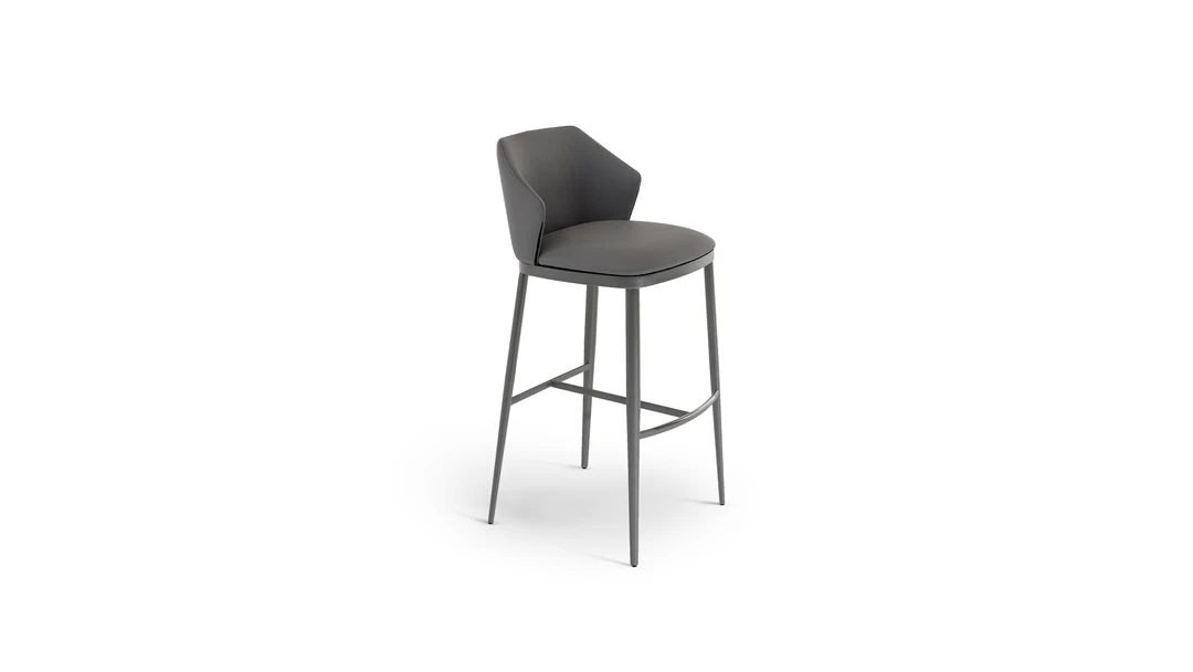 "Pair of Mida too chairs in eco-leather arranged around a minimalist table."