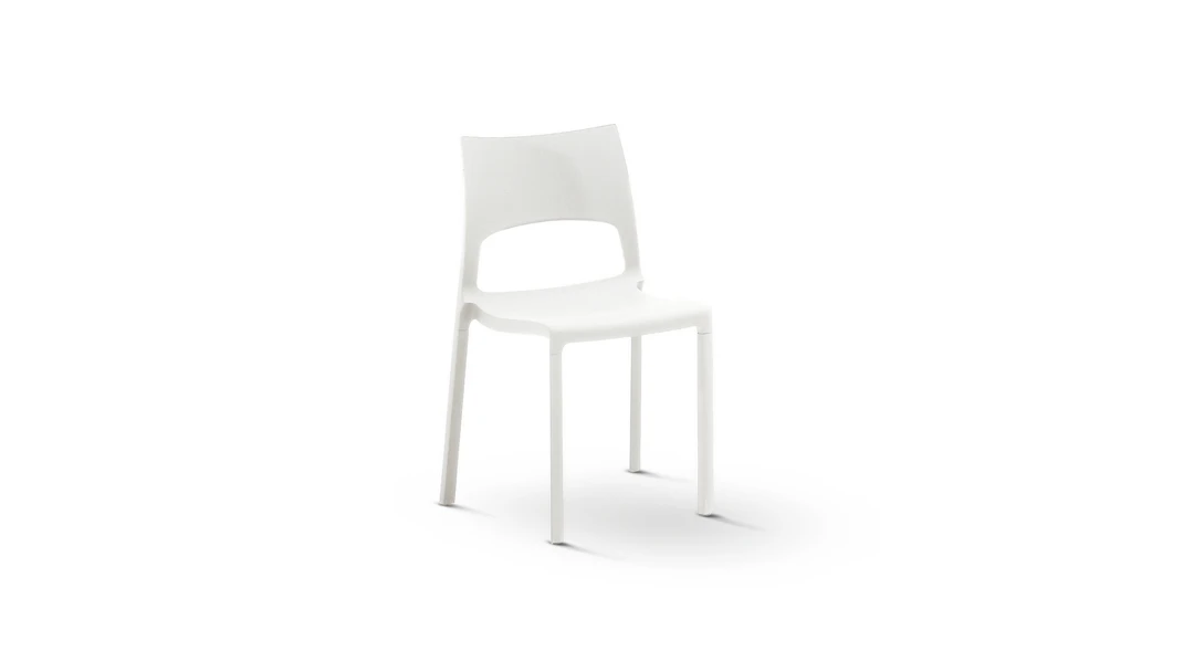"Back view of the Idol chair highlighting its subtle curvature and elegant simplicity."