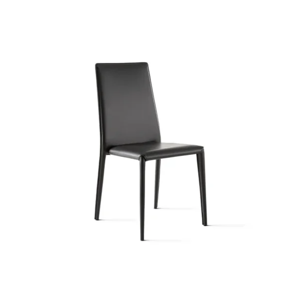 "Set of Eral chairs in muted tones around a minimalist dining table in a stylish interior."