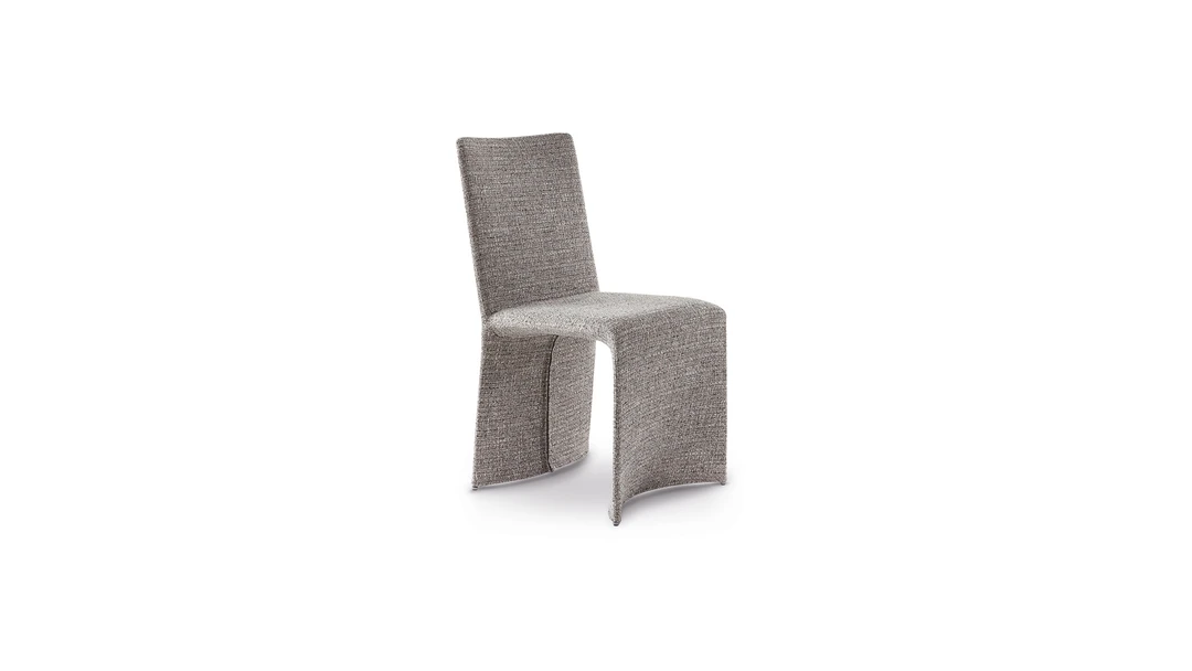 "Miss Ketch chair by Bonaldo with tall, curved backrest and arm support for enhanced comfort."