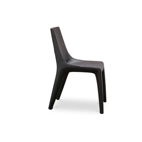 "Tip Toe chair in neutral fabric upholstery with slender angled metal legs, blending elegance and simplicity."