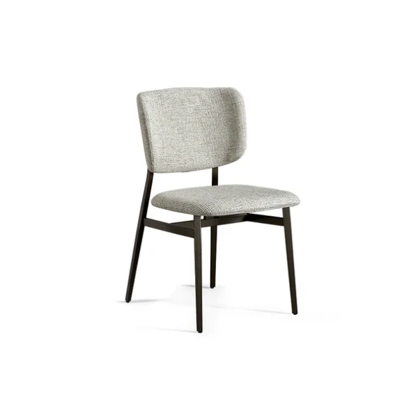 "Noor chair with slightly concave backrest and thin metal frame giving a refined, airy appearance."