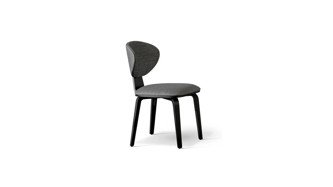 "Bonaldo Olos chair designed by Mauro Lipparini with enveloping wooden shell and fabric upholstery."