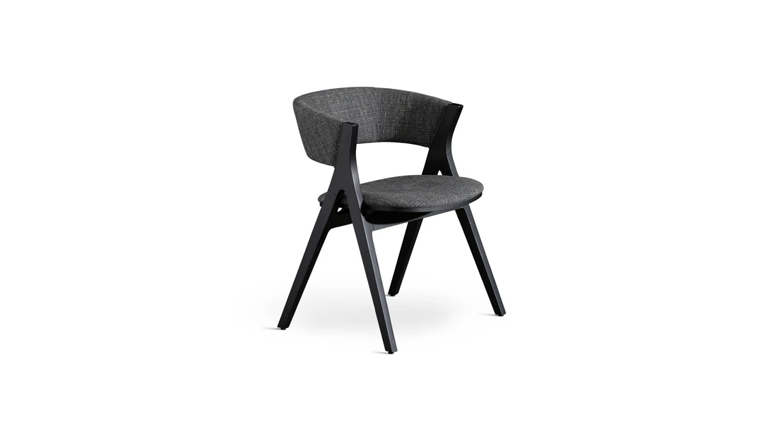"Stylish Remo chair by Bonaldo featuring warm wood tones and a softly curved backrest."