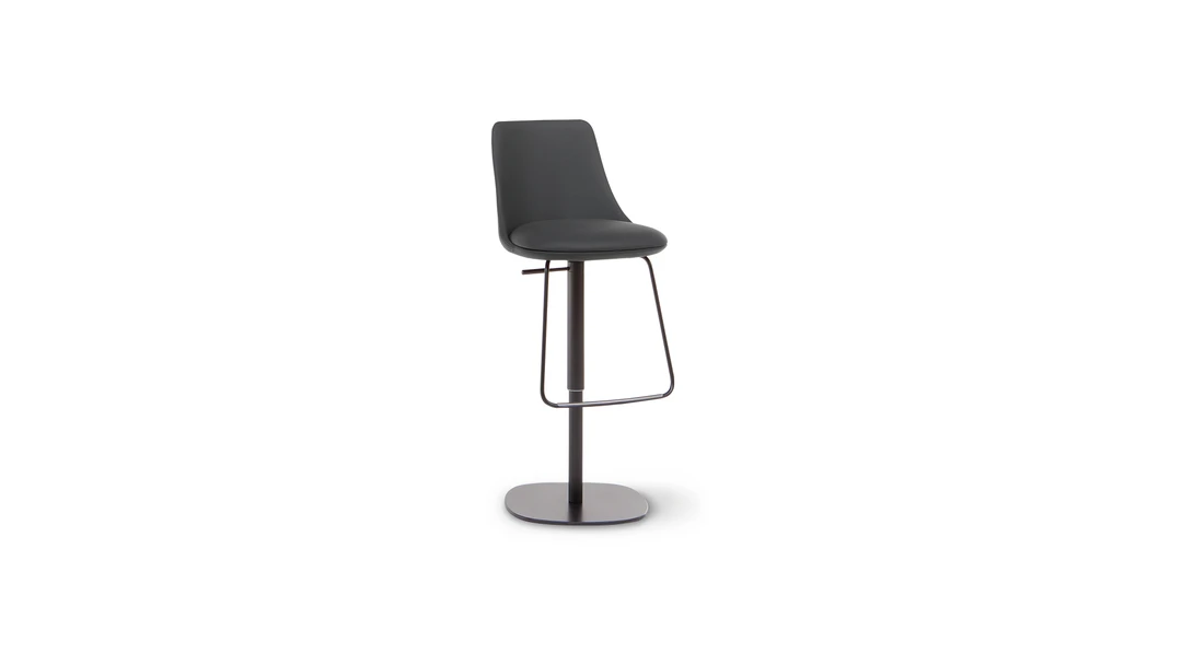 "Back view of Story People chair showing its enveloping shape and clean lines."