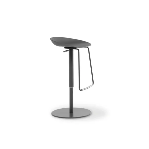 "Back view of Tab chair showcasing its soft curves and elegant simplicity."
