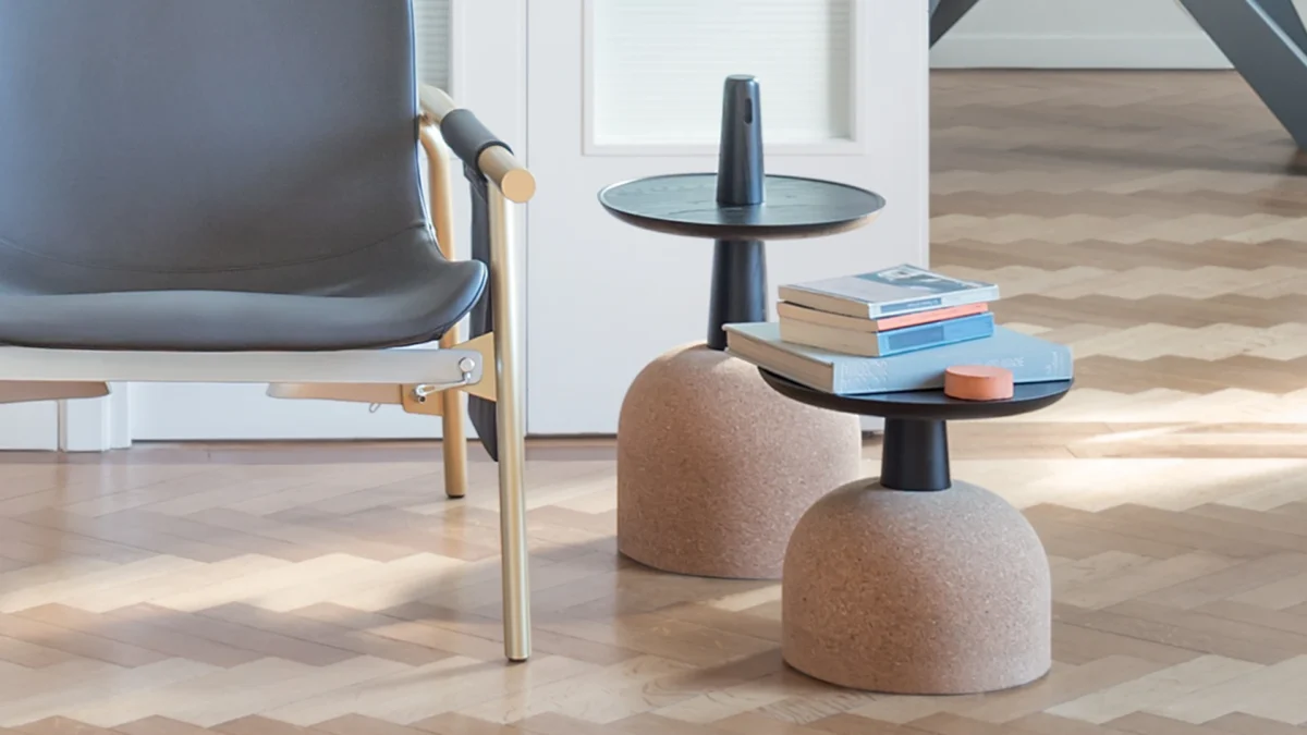 Bonaldo Assemblage low coffee table with painted ash wood disc and natural cork hemisphere base—perfect as a modular duo