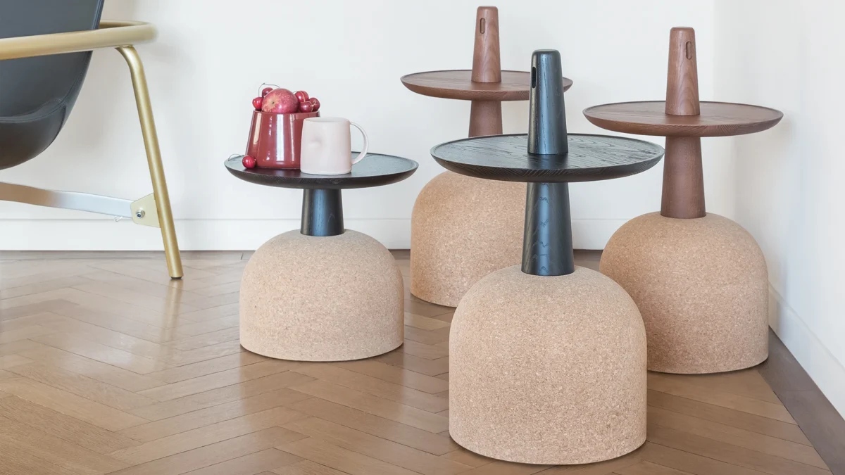 Contemporary Assemblage table by Bonaldo combining warm wood tabletop and sculptural cork pedestal for living spaces