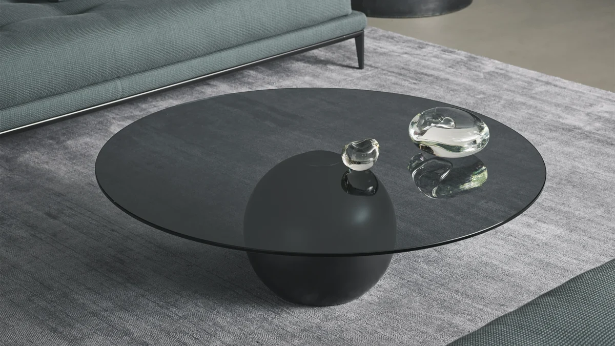 Fabrice Berrux Circus coffee table showcasing minimalist balance of mass and elegance via disc‑on‑sphere structure