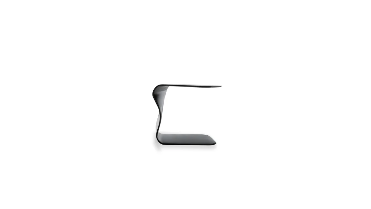 Bonaldo Duffy side table in matte white polyurethane with sculptural sinuous ribbon form