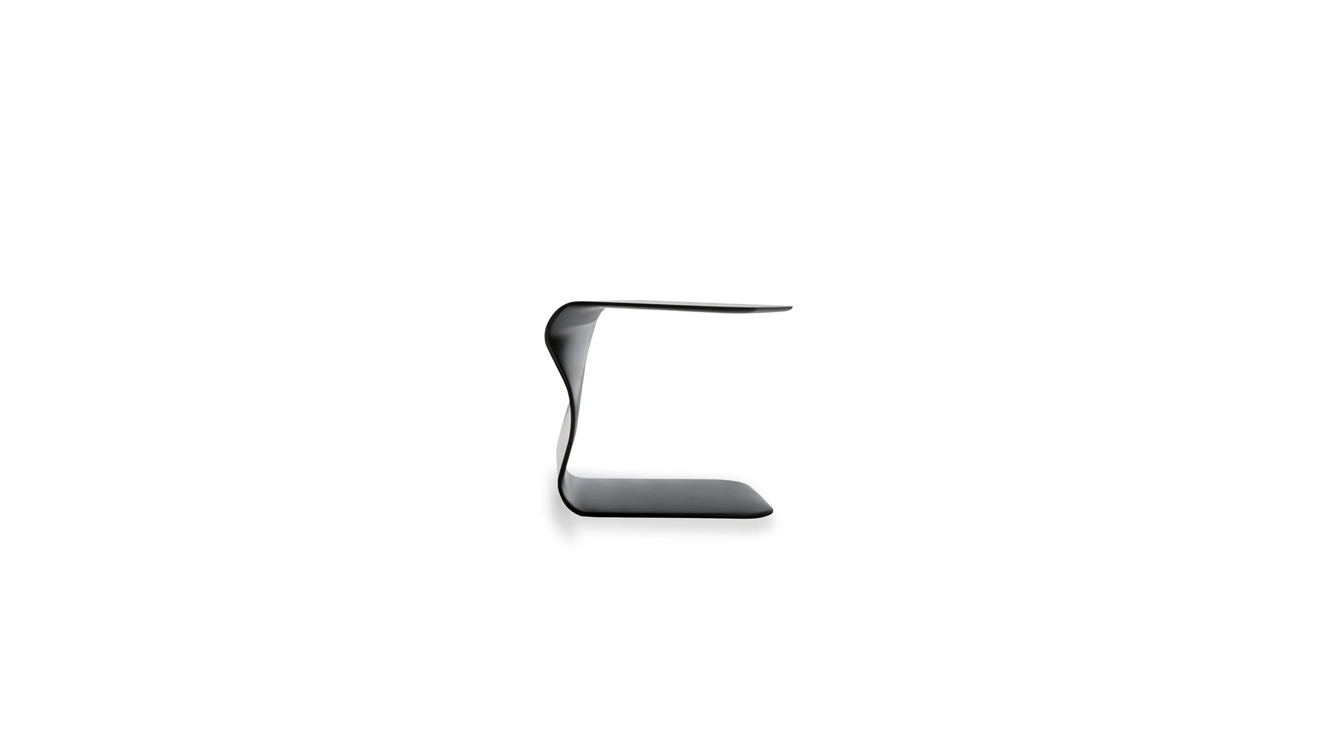 Bonaldo Duffy side table in matte white polyurethane with sculptural sinuous ribbon form