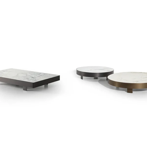 Bonaldo Jazz round coffee table with low-profile metal edge and floating ceramic top, supported on hidden geometric feet
