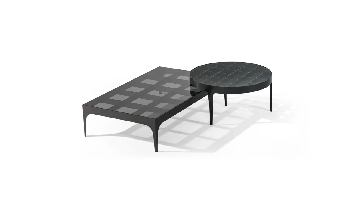 Bonaldo Passion dining table featuring dynamic crisscrossed metal legs in vibrant primary colors supporting a solid wood top