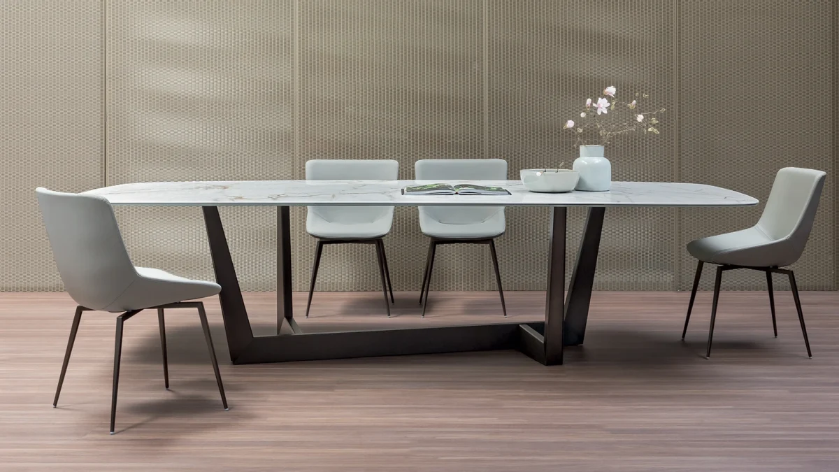 Gino Carollo’s Art Wood table featuring sculptural angled wooden base under a rectangular ceramic top
