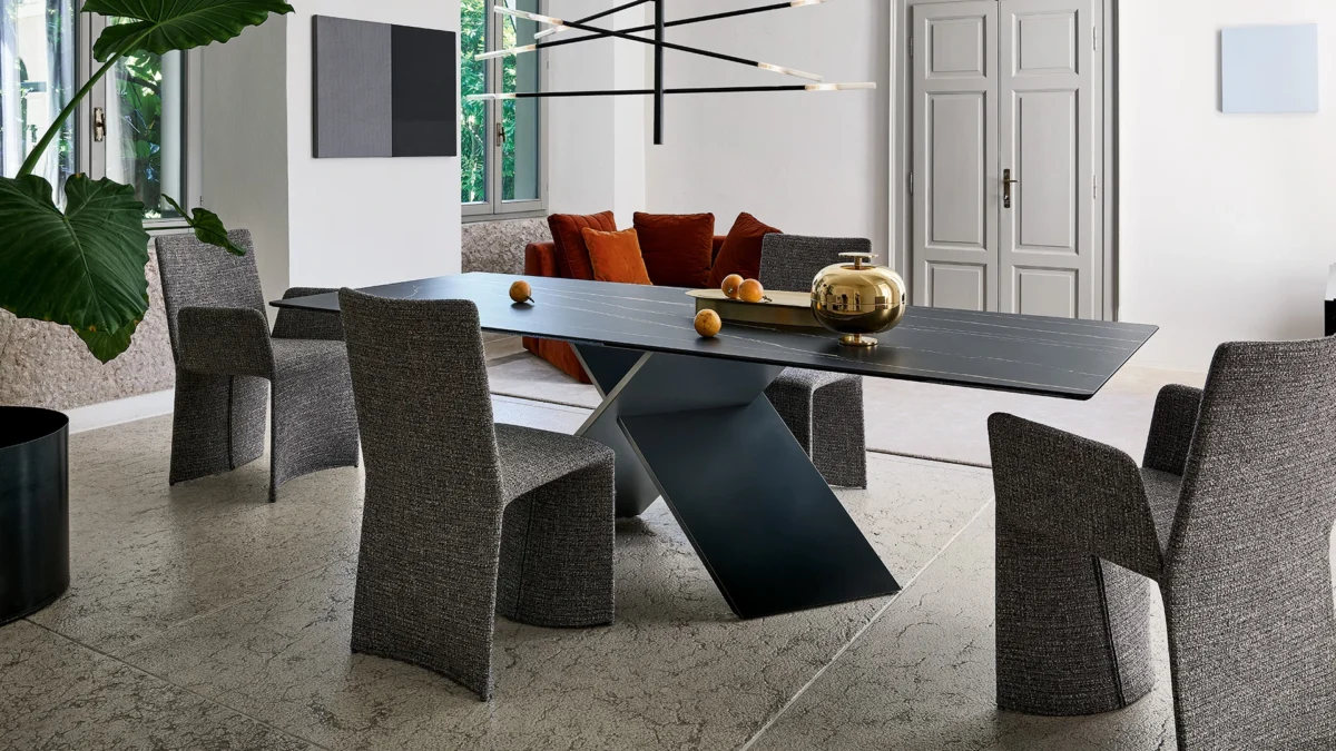 Bonaldo AX extendable table with geometric steel base and sleek ceramic-inset top, for modern dining spaces