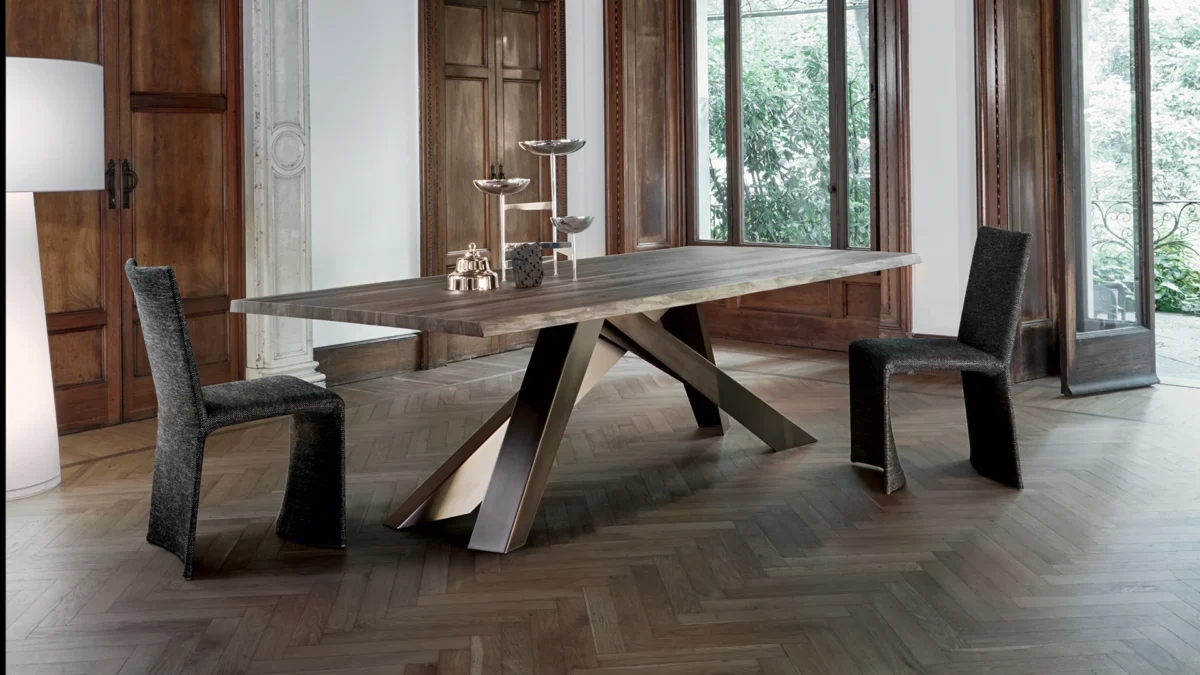 Alain Gilles’ Big Table with architecture-inspired steel leg structure and smooth ceramic-inset tabletop