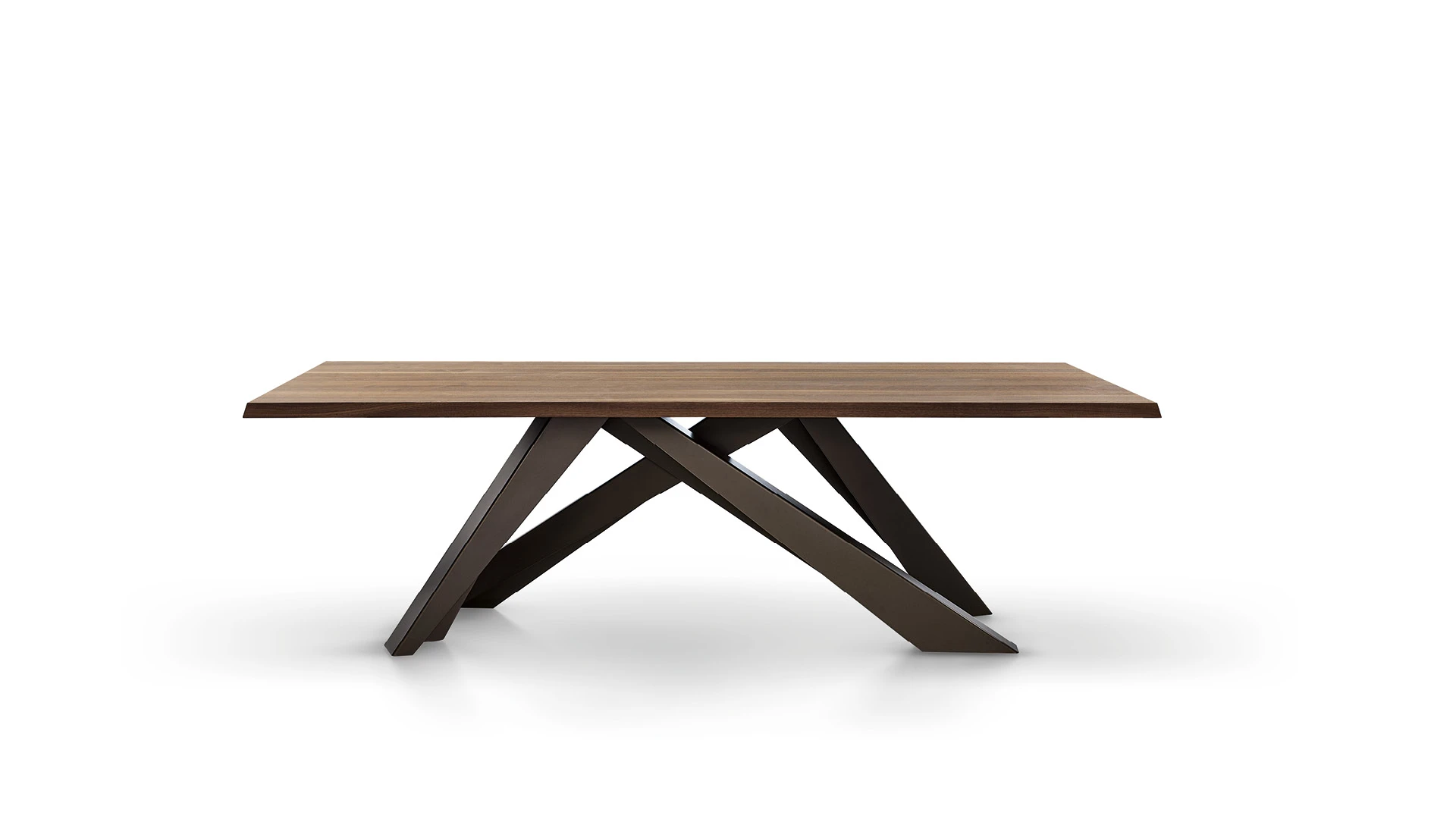 Bonaldo Big Table with sculptural laser-cut steel legs and rectangular solid wood top, combining dynamism with visual balance