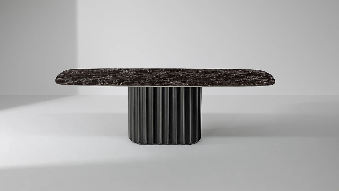 Bonaldo Dorian dining table with elongated cylindrical fluted base inspired by Doric columns and oval wood top