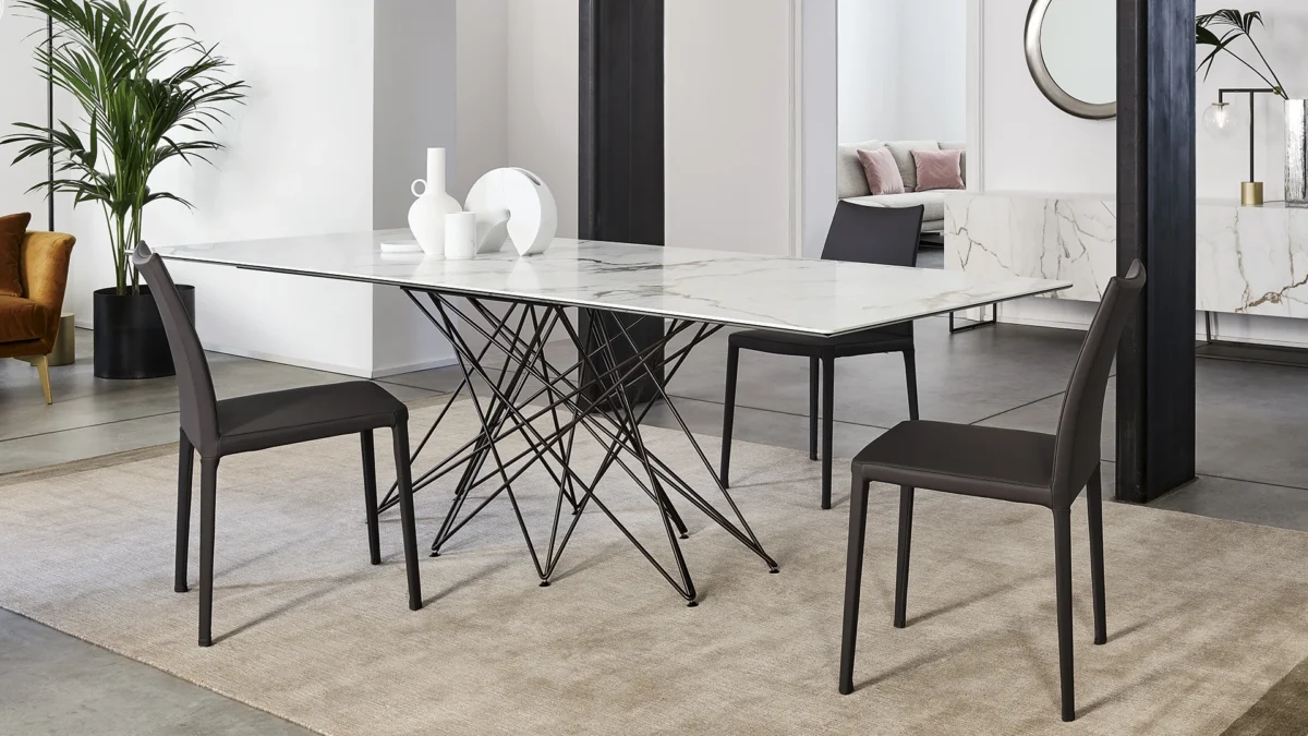 Contemporary Octa extendable table by Bonaldo, metal rod lattice base supporting ceramic top