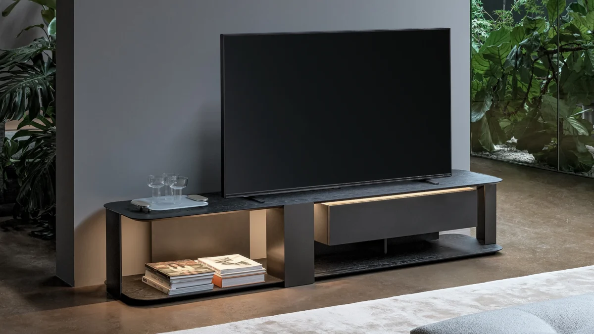 Paddle TV Stand Light by Bonaldo with integrated LED strip lighting beneath upper shelf for ambient glow and floating effect.