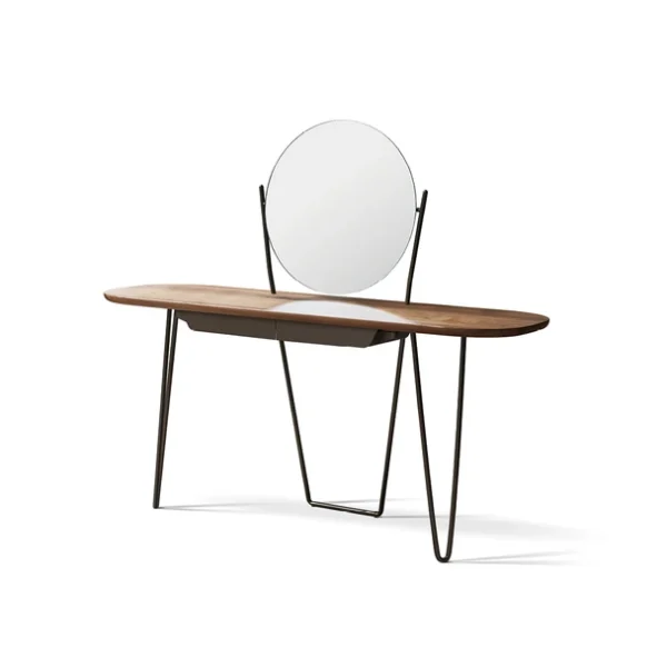 "Cosine Plus in velvet with gently sloped arms and slender painted metal legs."
