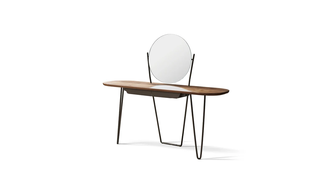"Cosine Plus in velvet with gently sloped arms and slender painted metal legs."