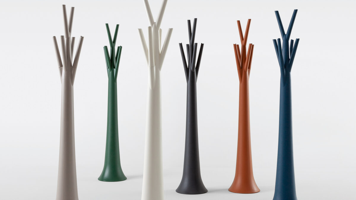 "Tree Light emitting a soft ambient glow through its translucent polyethylene structure."