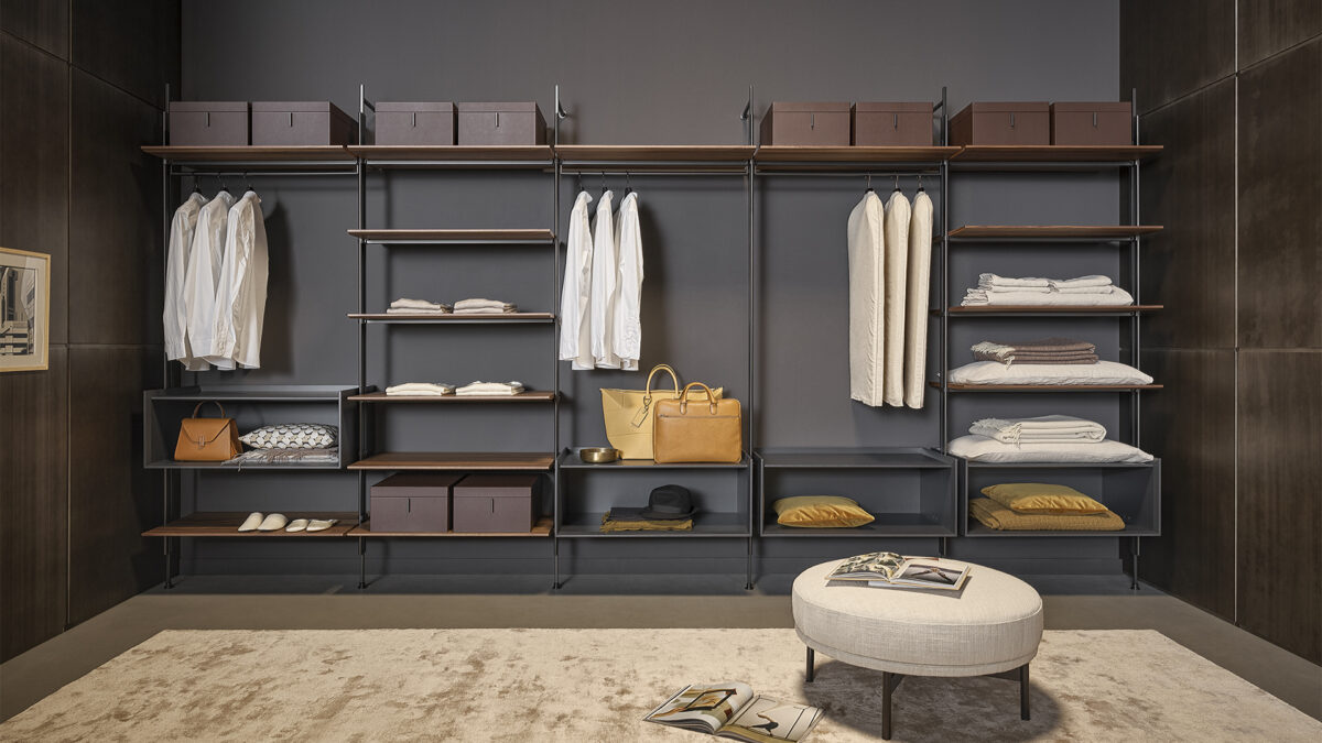 Sculptural Roll walk-in closet by Bonaldo built for storage and display: open structure, wooden containers, optional ecoleather boxes.