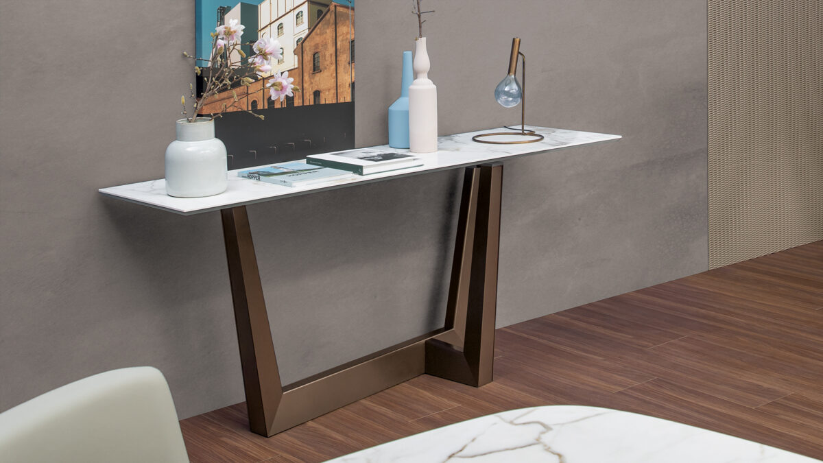 "Detail shot of the Art Console’s lacquered metal base with architectural styling."