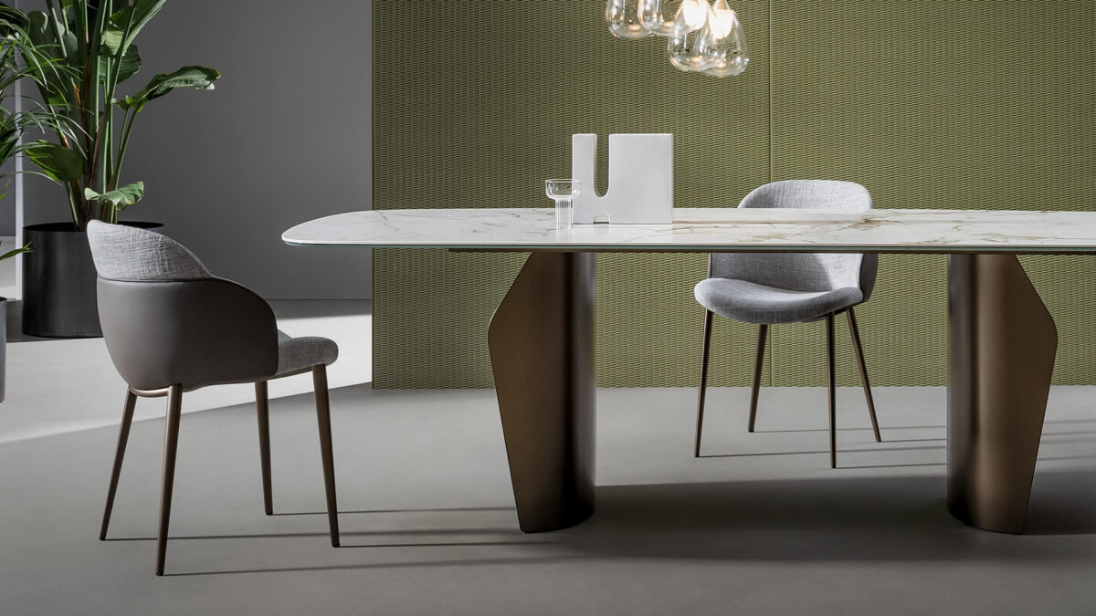 “Bonaldo My Way dining chair featuring rounded padded back and disc‑style seat on matte metal base.”