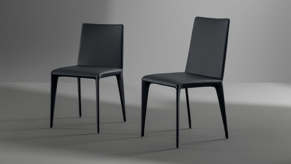 "Filly chair by Bonaldo with minimalist padded seat and slim metal legs in matte finish."