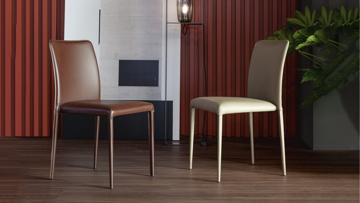 "Deli chair by Bonaldo with sleek upholstered seat and backrest, supported by slim metal legs."