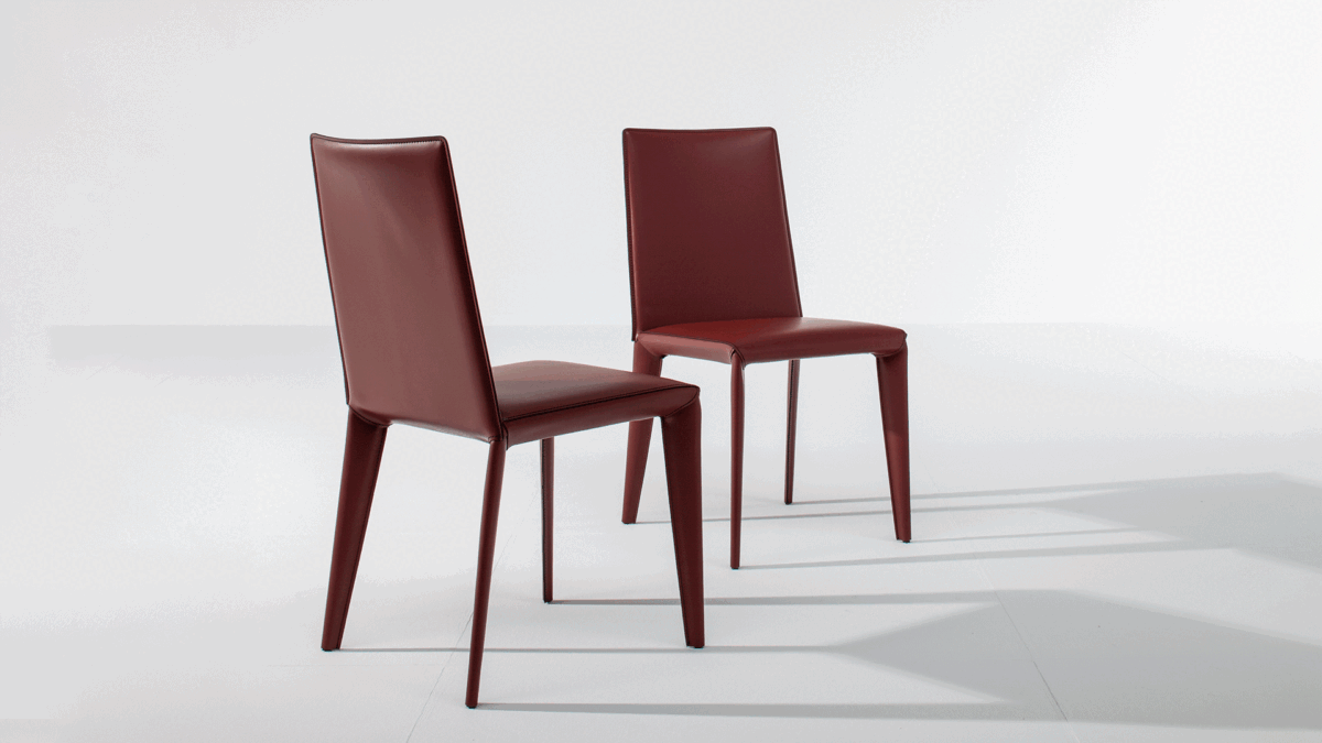 "Filly Large Up chair by Bonaldo featuring extended backrest and cushioned seat for enhanced support."