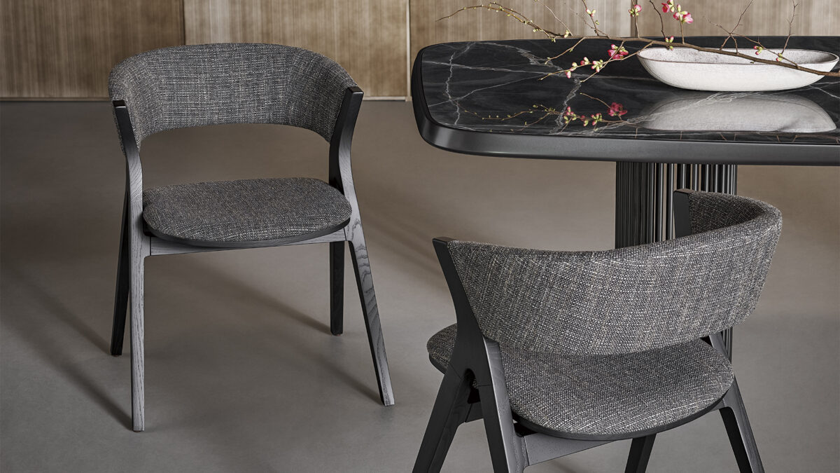 "Modern Remo dining chair by Bonaldo with natural ash wood frame and soft fabric upholstery."