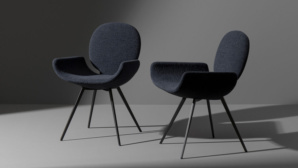 "Yay chair by Bonaldo showcasing smooth contours and natural wood legs."
