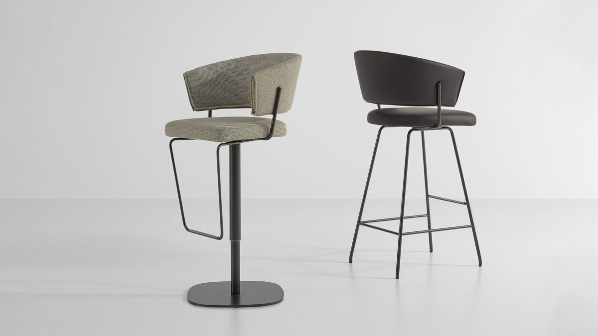 "Bahia too chair by Bonaldo with fabric upholstery and cross-shaped swivel base in matte black."