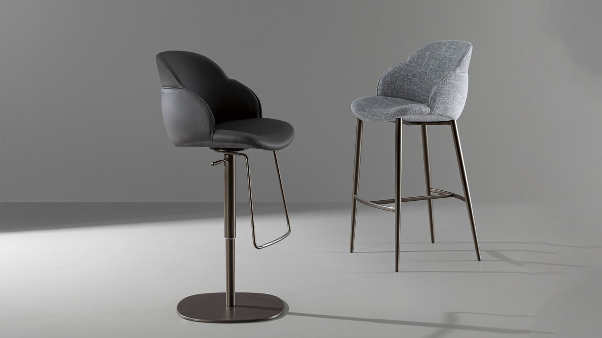 "Back view of My Way too chair showing its soft curves and clean tailoring."