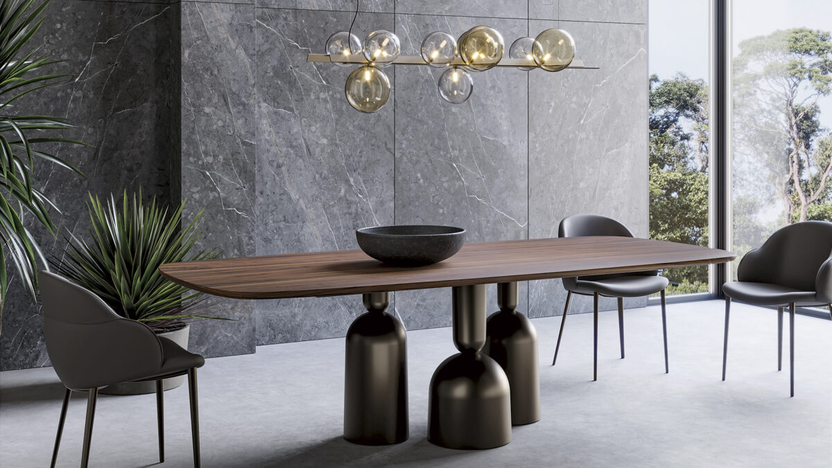 Designer console table Cop by Bonaldo featuring stylized bottle‑like metal legs and marble top
