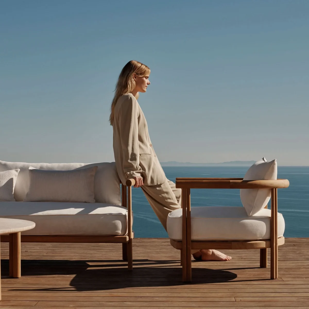 “Detail shot of frame and cushion – Cove Teak 3 Seater by Harbour showcasing craftsmanship and texture”
