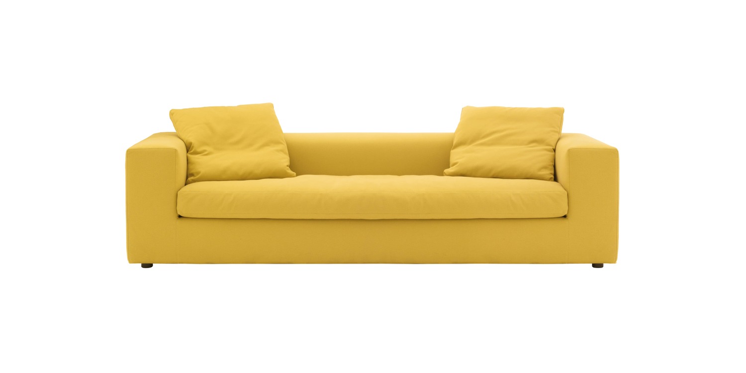 “Cuba 25 sofa by Cappellini – low-profile three-seater upholstered in vibrant orange fabric, featuring loose back cushions and a sleek rectangular silhouette.”