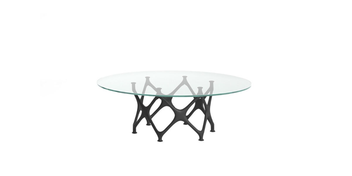 "Functional and stylish modular table design with signature X-shaped support – Cappellini."