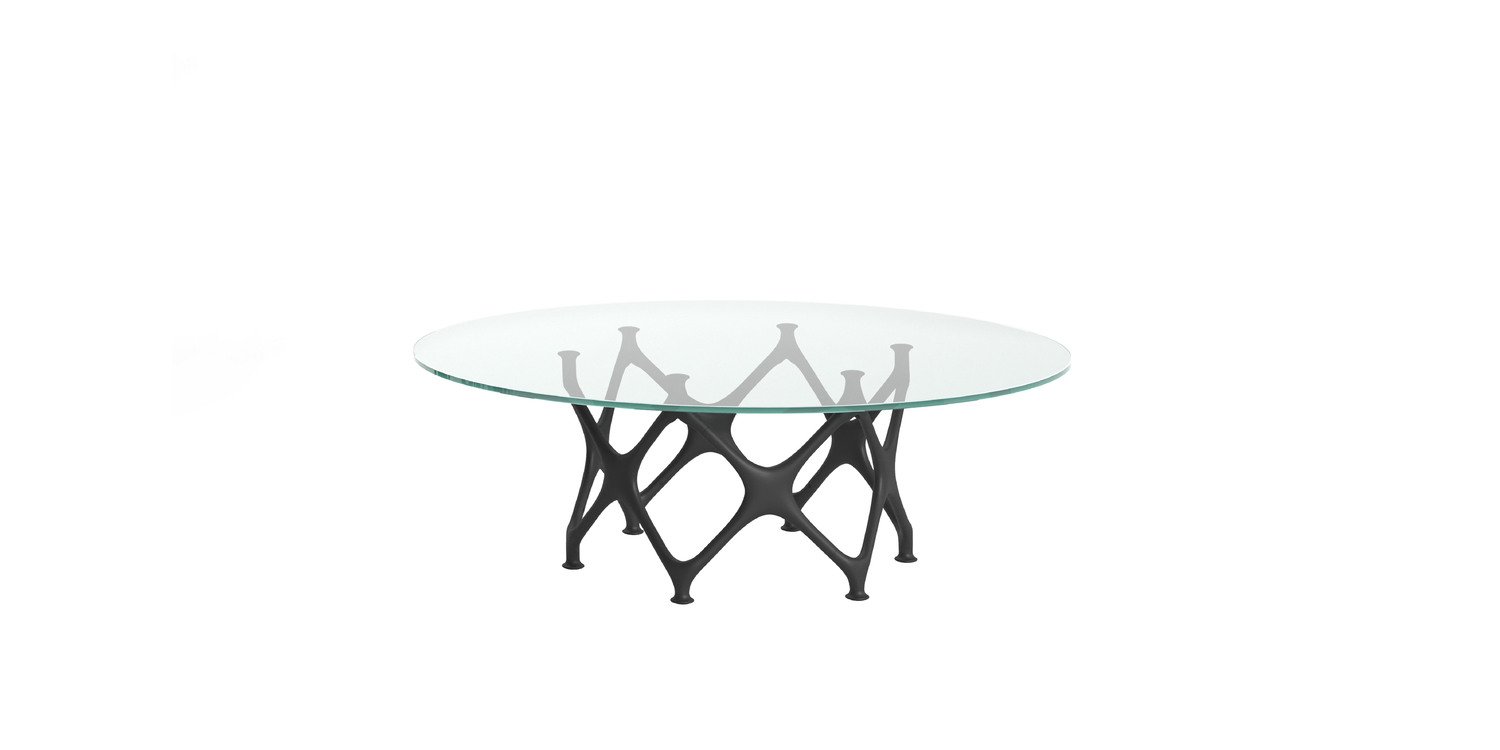 "Functional and stylish modular table design with signature X-shaped support – Cappellini."