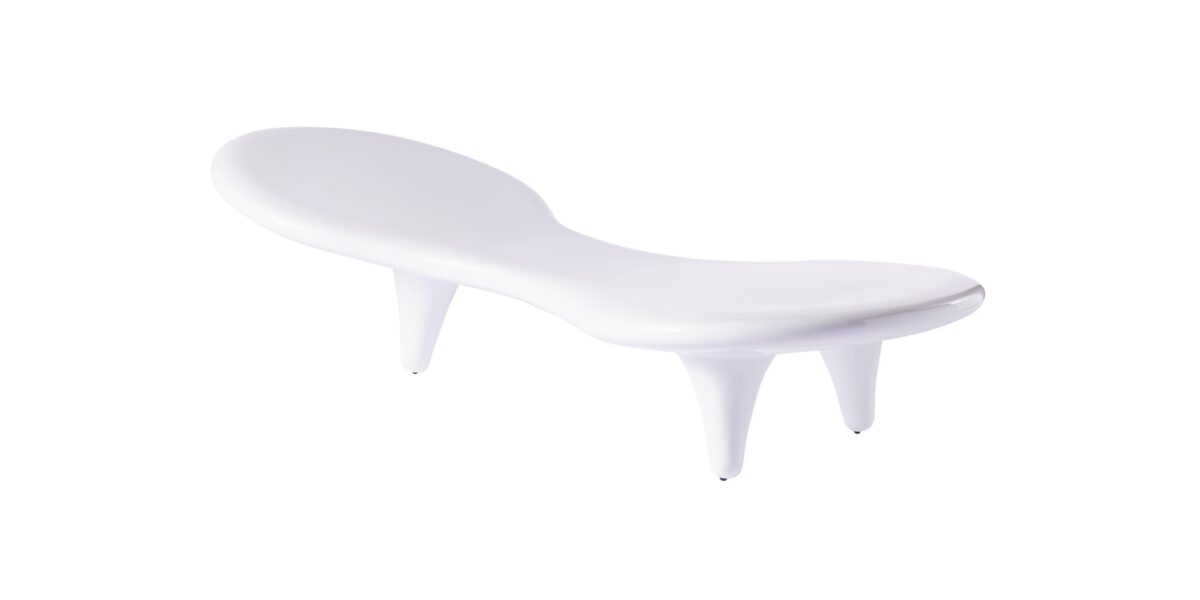 “Detail of the Orgone Table's conical legs and smooth, flowing surface in white lacquered fiberglass.”