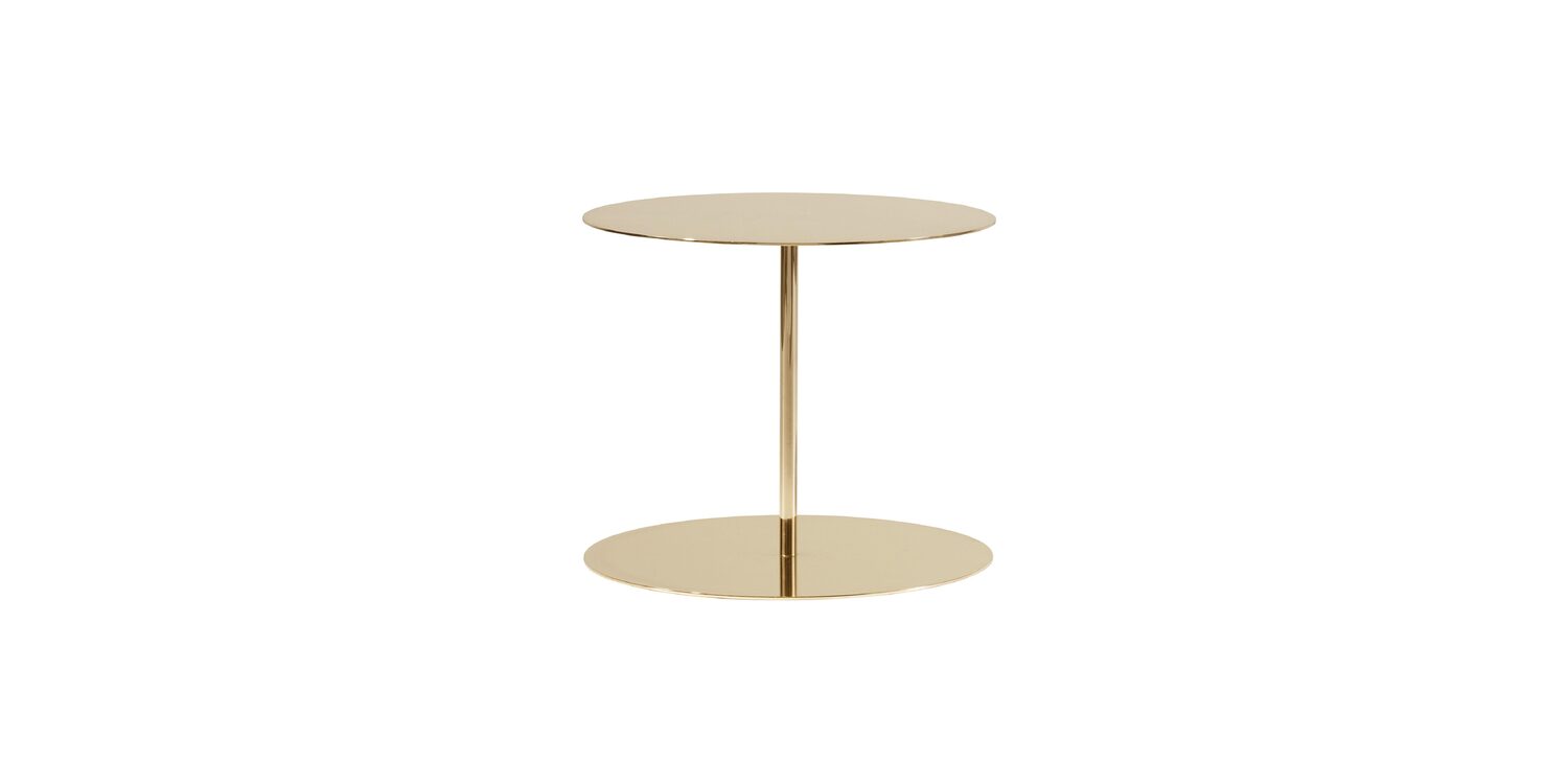 "Sculptural metallic table designed for sophisticated interiors – Gong Lux by Cappellini."