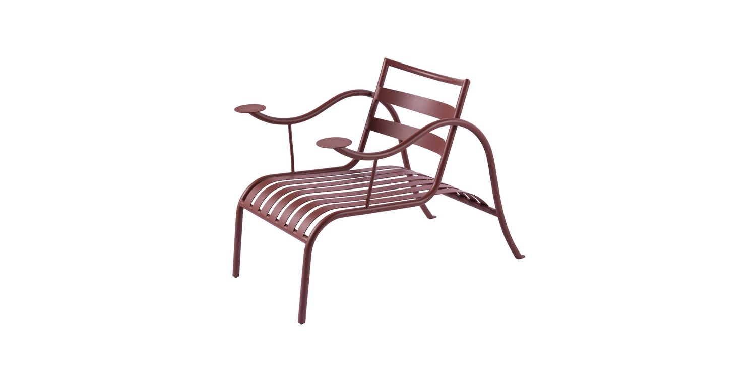 A sculptural designer chair combining comfort and minimalism, known as the Thinking Man’s Chair.