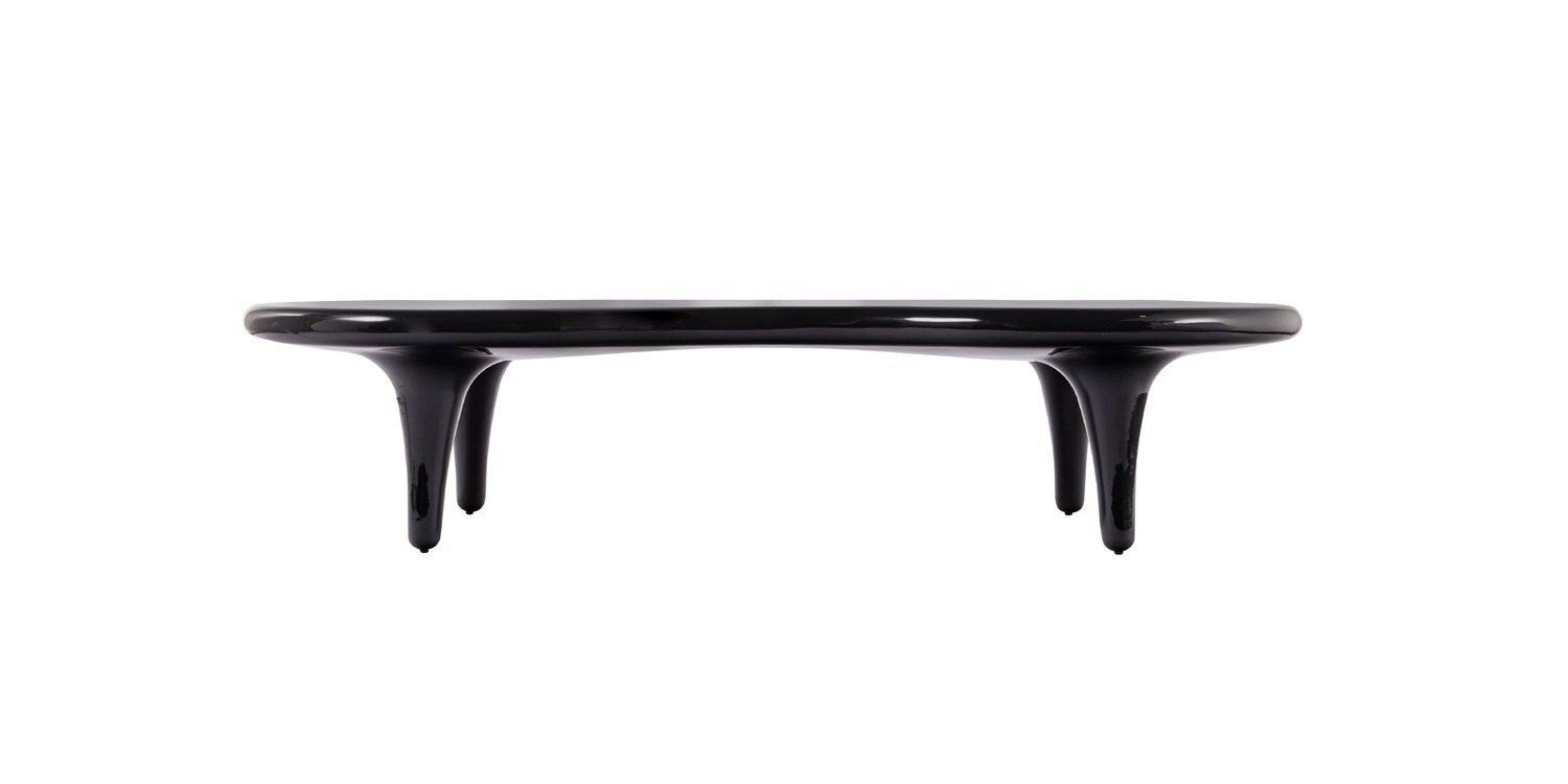 "Contemporary table with artistic base inspired by natural forms – Cappellini Orgone."